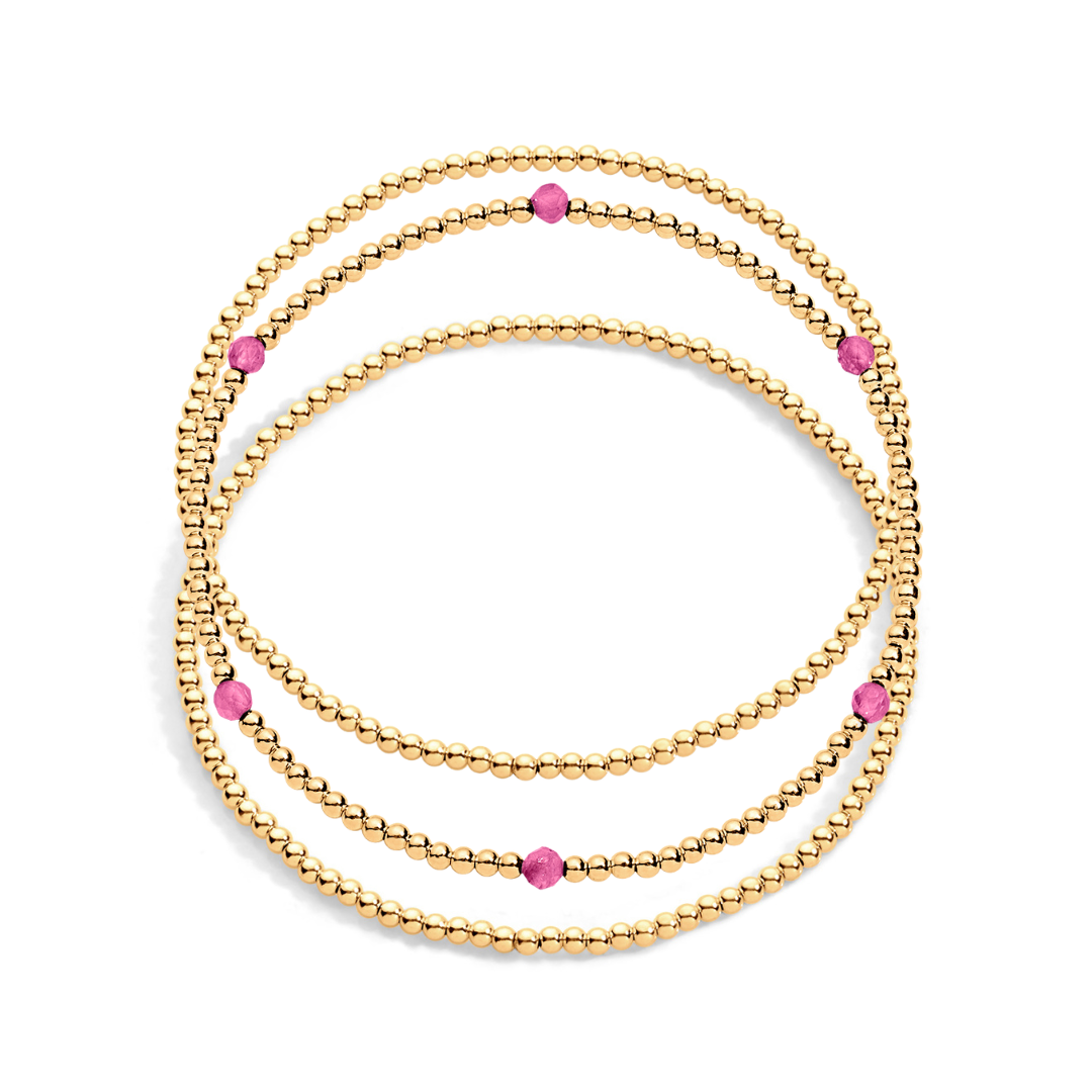 3 gold filled beaded bracelet and one with pink gemstones