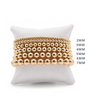 6 gold filled beaded bracelet on pillow of various sizes from 2mm to 7mm