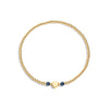 gold bracelet with 2 sapphire gemstones