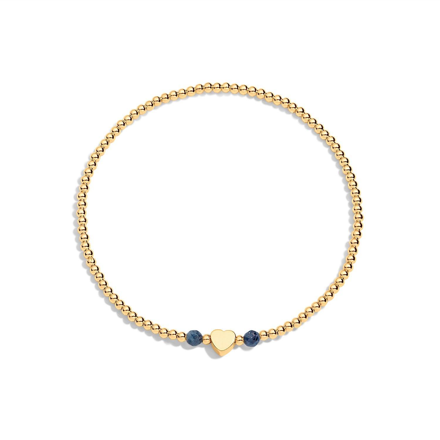 gold bracelet with 2 sapphire gemstones