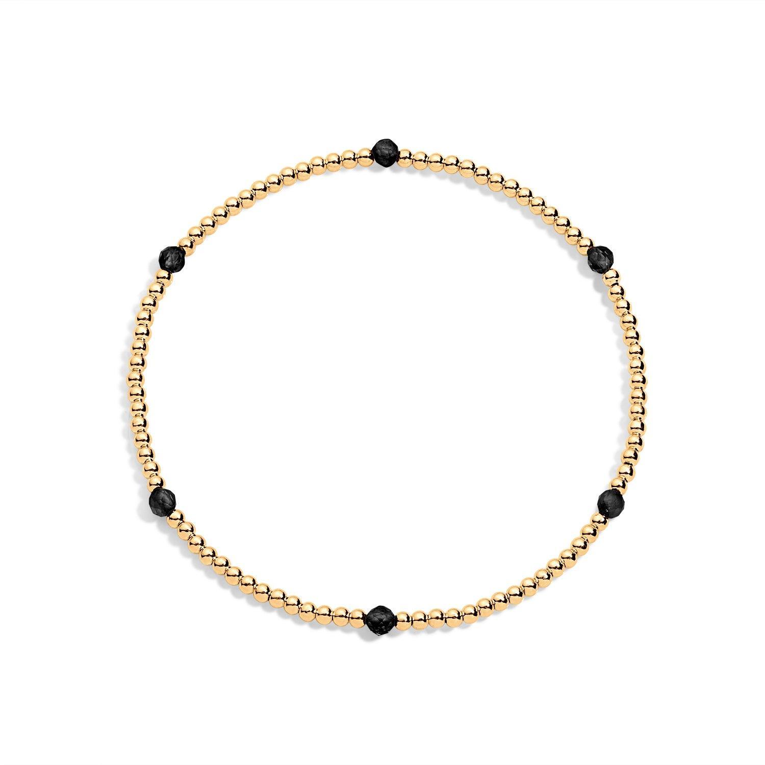 Gold filled beaded bracelet and black gemstones